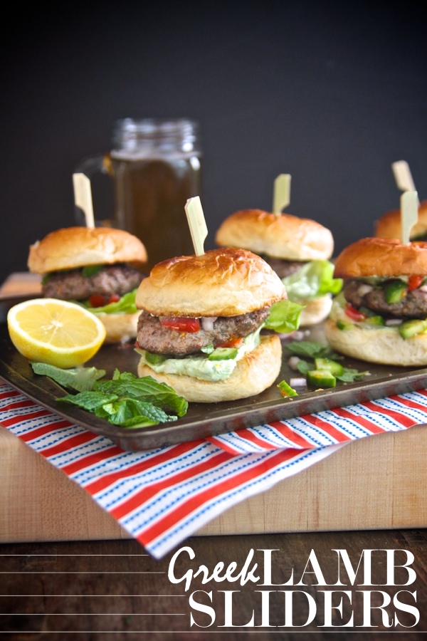 Greek Lamb Sliders with a whipped feta sauce & a Greek salad relish. Check out more at Shutterbean.com