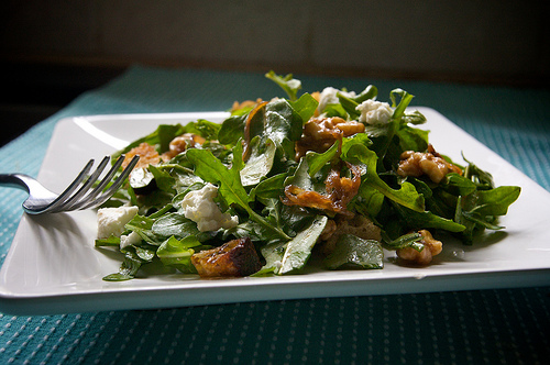 Arugula w/ Caramelized Onions + Walnuts