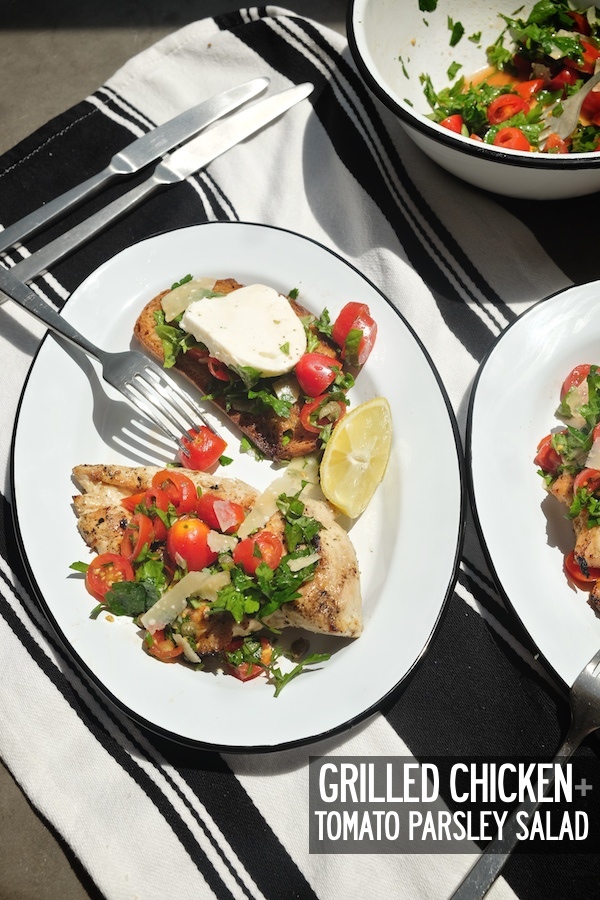 Put together an easy weeknight dinner with this Grilled Chicken + Tomato Parsley Salad recipe. Check it out on Shutterbean.com!