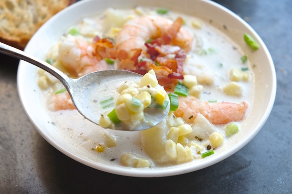 For those chilly Summer nights, make Corn & Shrimp Chowder. Pairs perfectly with grilled garlic bread. Recipe on Shutterbean.com