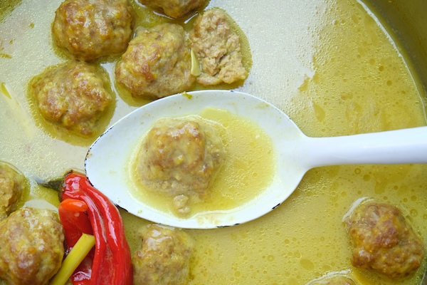 Ginger Pork Meatballs with a delicious Coconut Broth will warm up your weeknight dinners. Find the recipe at Shutterbean.com! 