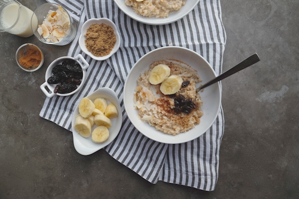 Coconut Steel Cut Oats made with coconut milk in the rice cooker! Find the recipe on Shutterbean.com!