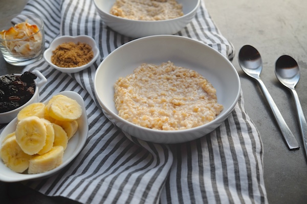 Coconut Steel Cut Oats made with coconut milk in the rice cooker! Find the recipe on Shutterbean.com!