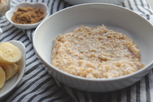 Coconut Steel Cut Oats made with coconut milk in the rice cooker! Find the recipe on Shutterbean.com!