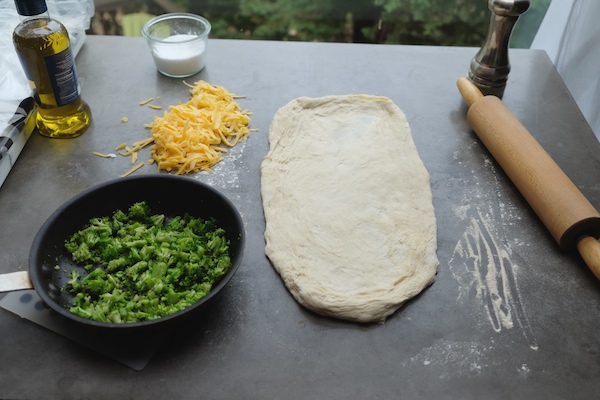 Transform store bought pizza dough into Broccoli Cheddar Rolls. It makes for a perfect weeknight dinner! Recipe on Shutterbean.com 