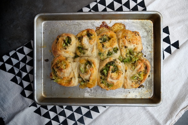 Transform store bought pizza dough into Broccoli Cheddar Rolls. It makes for a perfect weeknight dinner! Recipe on Shutterbean.com 