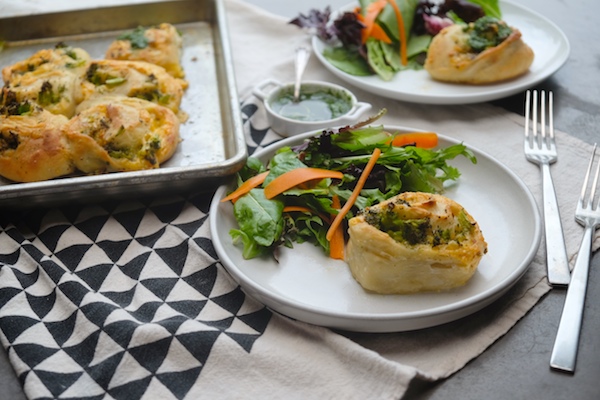 Transform store bought pizza dough into Broccoli Cheddar Rolls. It makes for a perfect weeknight dinner! Recipe on Shutterbean.com 