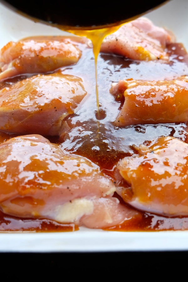 The most delicious & simple Apricot Glazed Chicken Thigh recipe can be found at Shutterbean.com! 