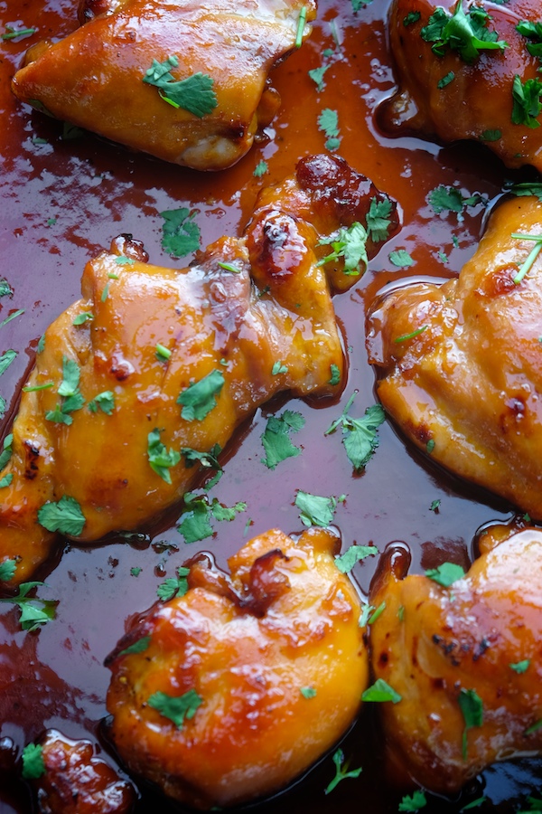 The most delicious & simple Apricot Glazed Chicken Thigh recipe can be found at Shutterbean.com! 