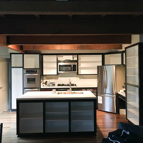 See how Tracy of Shutterbean transforms her taupe kitchen cabinets to BLACK. Around the House: The Kitchen After photos are on Shutterbean.com!