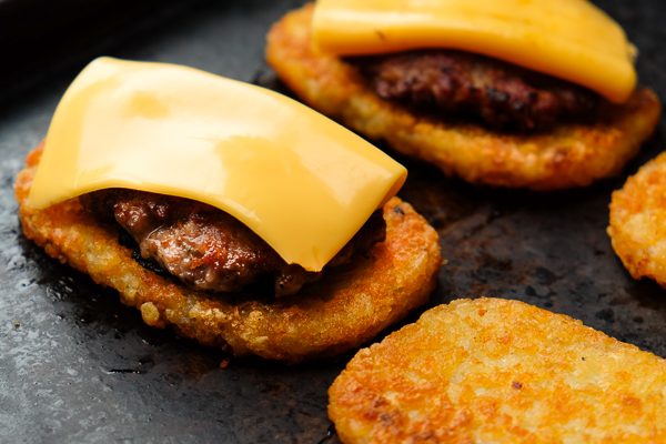 What makes this The Ultimate Breakfast Sandwich? The hash browns that sandwich homemade breakfast sausage, egg & cheese. Find the recipe on Shutterbean.com!