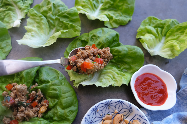 Chicken Lettuce Cups are a healthy low carb dinner option that comes together so easily. Find the recipe at Shutterbean.com!