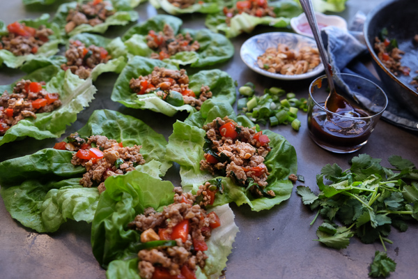 Chicken Lettuce Cups are a healthy low carb dinner option that comes together so easily. Find the recipe at Shutterbean.com!