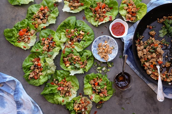 Chicken Lettuce Cups are a healthy low carb dinner option that comes together so easily. Find the recipe at Shutterbean.com!