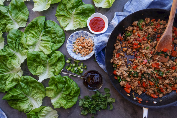 Chicken Lettuce Cups are a healthy low carb dinner option that comes together so easily. Find the recipe at Shutterbean.com!