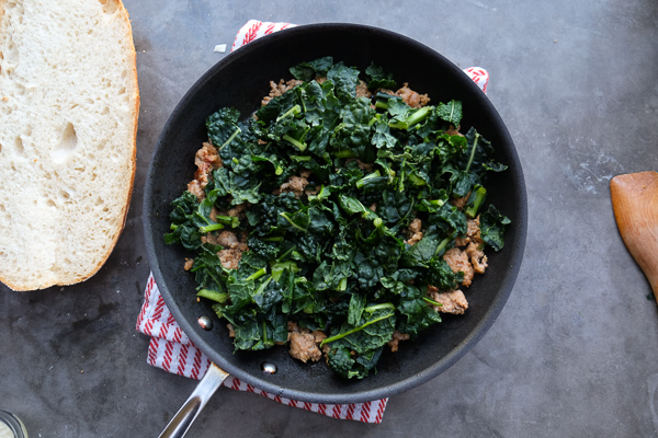 Sausage & Kale French Bread Pizzas are sure to be a crowd pleaser around the dinner table. Find the recipe at Shutterbean.com