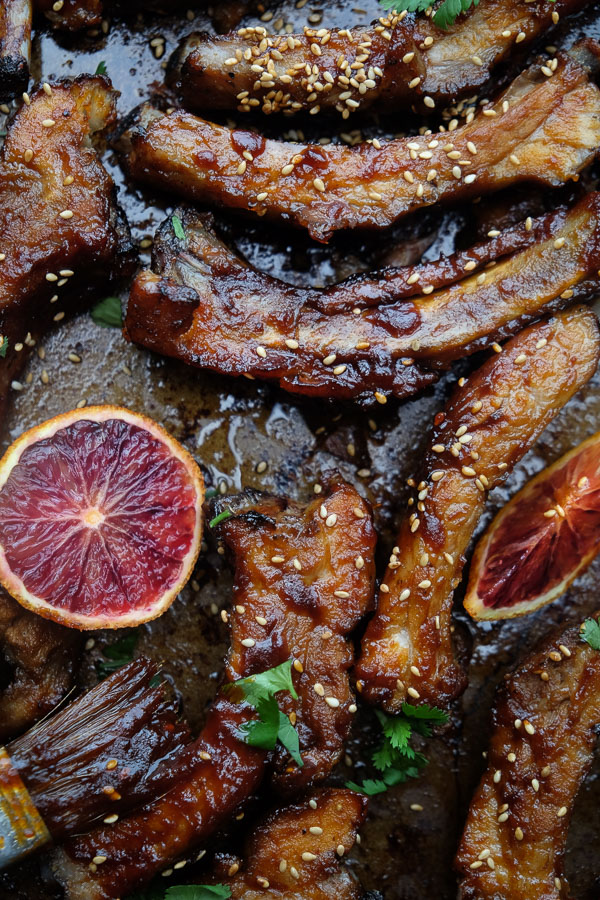 Orange Soy Glazed Ribs can be made easily in the oven. No grill required. Find the recipe on Shutterbean.com!