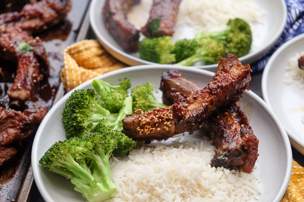 Orange Soy Glazed Ribs can be made easily in the oven. No grill required. Find the recipe on Shutterbean.com!