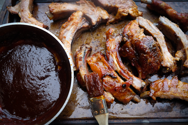 Orange Soy Glazed Ribs can be made easily in the oven. No grill required. Find the recipe on Shutterbean.com!