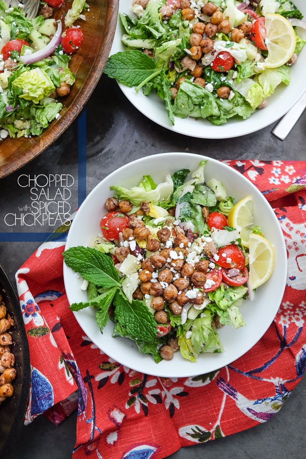 Chopped Salad with Spiced Chickpeas made with a lemon tahini dressing. Find the recipe on Shutterbean.com!