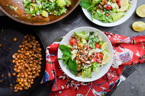 Chopped Salad with Spiced Chickpeas made with a lemon tahini dressing. Find the recipe on Shutterbean.com!