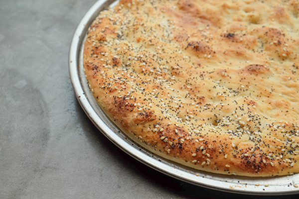 Lox Bagel Pizza- Perfect for weeknight dinners/afternoon brunches and parties! Find the recipe on Shutterbean.com!