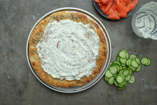 Lox Bagel Pizza- Perfect for weeknight dinners/afternoon brunches and parties! Find the recipe on Shutterbean.com!