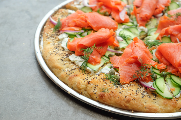 Lox Bagel Pizza- Perfect for weeknight dinners/afternoon brunches and parties! Find the recipe on Shutterbean.com!