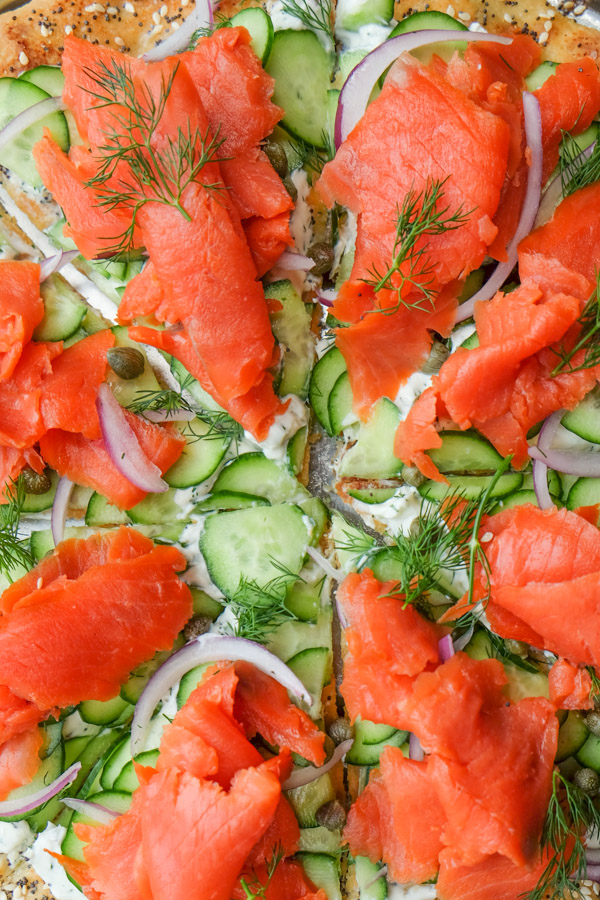 Lox Bagel Pizza- Perfect for weeknight dinners/afternoon brunches and parties! Find the recipe on Shutterbean.com!