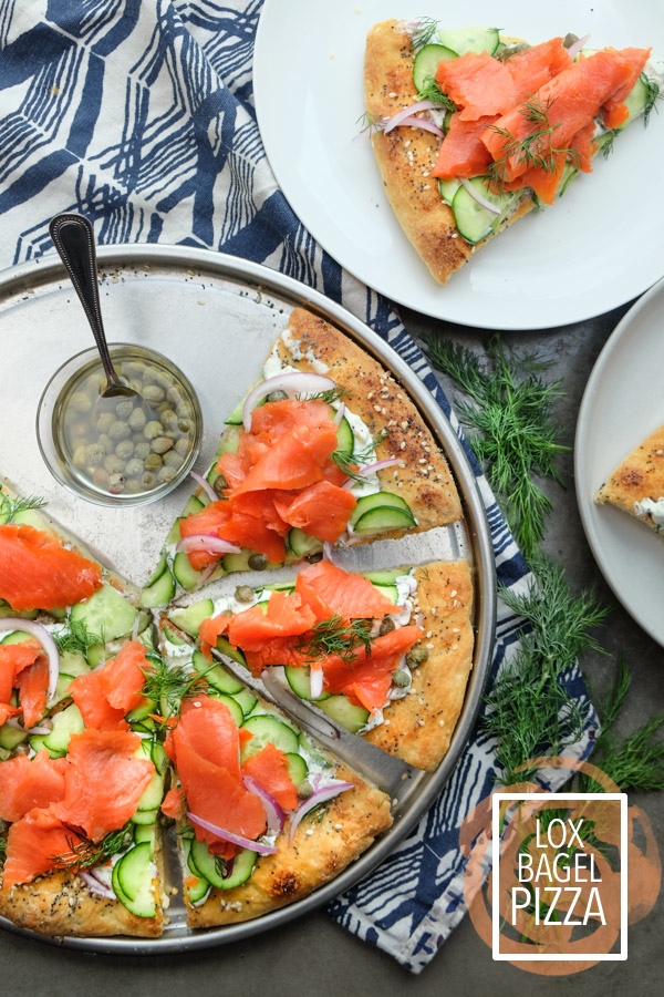 Lox Bagel Pizza- Perfect for weeknight dinners/afternoon brunches and parties! Find the recipe on Shutterbean.com!