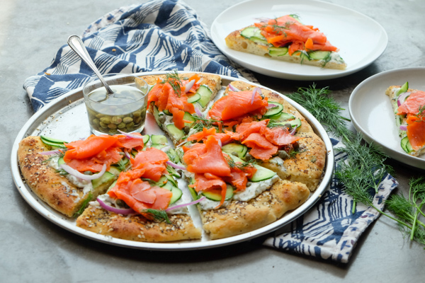 Lox Bagel Pizza- Perfect for weeknight dinners/afternoon brunches and parties! Find the recipe on Shutterbean.com!