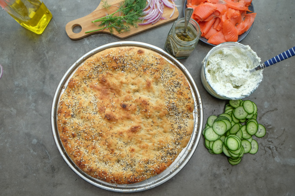 Lox Bagel Pizza- Perfect for weeknight dinners/afternoon brunches and parties! Find the recipe on Shutterbean.com!