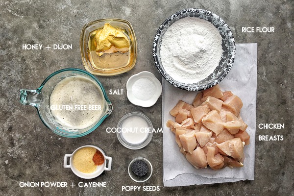 Crispy Gluten Free Chicken Nuggets with Honey Dijon Poppy Seed Dip. Find the recipe on Shutterbean.com!