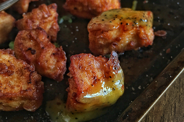 Crispy Gluten Free Chicken Nuggets with Honey Dijon Poppy Seed Dip. Find the recipe on Shutterbean.com!