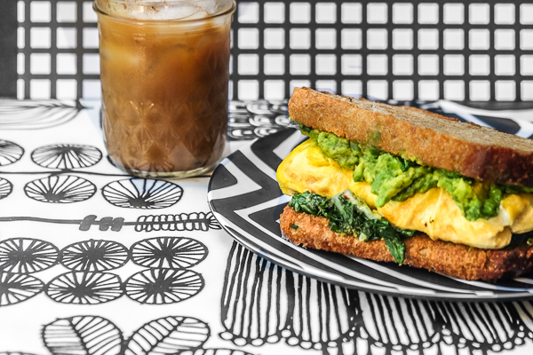 Spinach Egg Breakfast Sandwich is a healthy way to fill you up in the morning. Find the recipe on Shutterbean.com