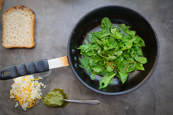 Spinach Egg Breakfast Sandwich is a healthy way to fill you up in the morning. Find the recipe on Shutterbean.com