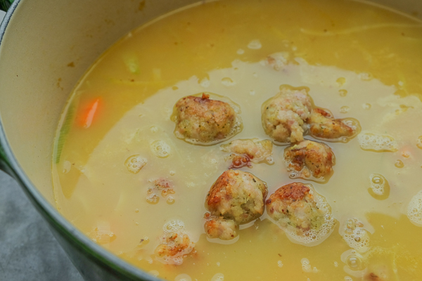 Spring Minestrone with Chicken Meatballs is a perfect soup for those chilly Spring days. Find the recipe on Shutterbean.com!