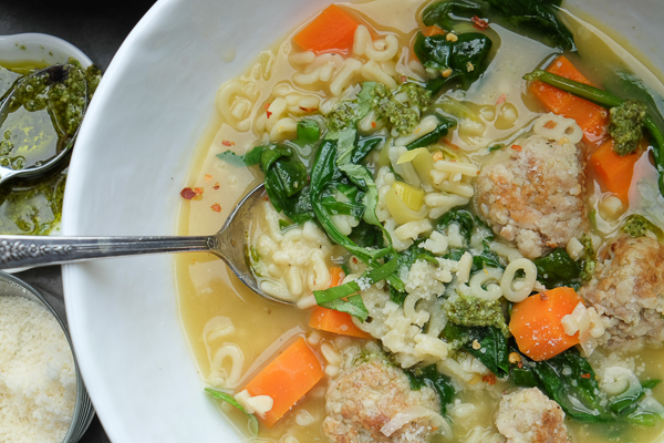 Spring Minestrone with Chicken Meatballs is a perfect soup for those chilly Spring days. Find the recipe on Shutterbean.com!