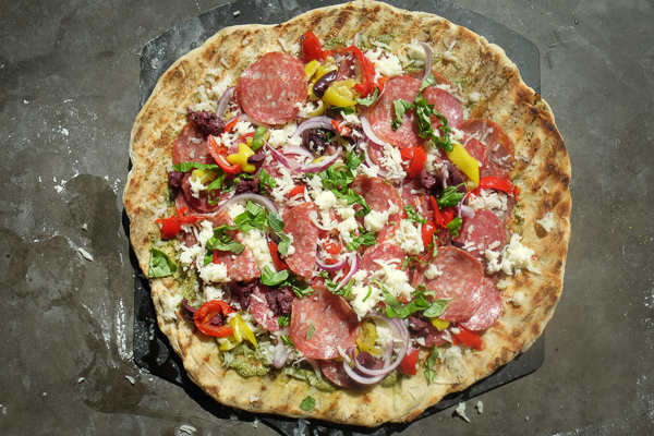Turn the classic muffuletta sandwich into a pizza with this Muffuletta Pizza. Find the recipe on Shutterbean.com!