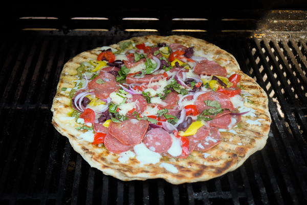 Turn the classic muffuletta sandwich into a pizza with this Muffuletta Pizza. Find the recipe on Shutterbean.com!