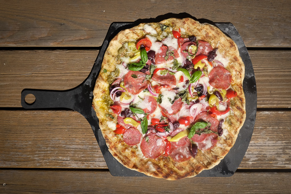 Turn the classic muffuletta sandwich into a pizza with this Muffuletta Pizza. Find the recipe on Shutterbean.com!