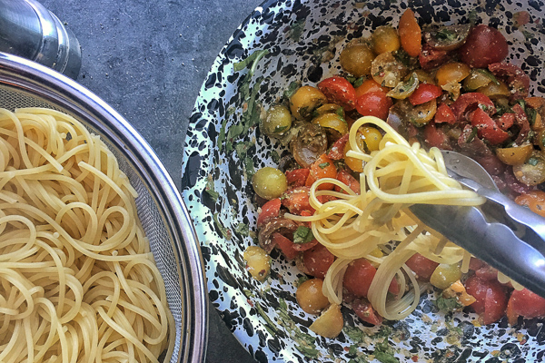 Quick Tomato Basil Pasta is a great idea for a simple weeknight dinner. Find the recipe on Shutterbean.com