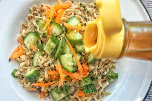 Cold Sesame Noodles are incredible versatile. Pair them with your favorite protein. Find the recipe on Shutterbean.com