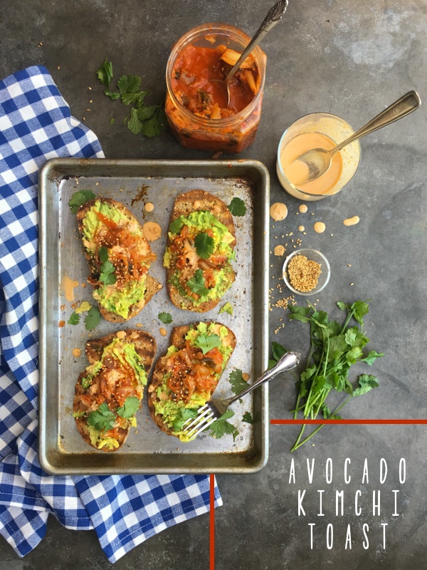 This isn't ordinary avocado toast. It's Avocado Kimchi Toast with a spicy tahini drizzle. Find recipe at Shutterbean.com