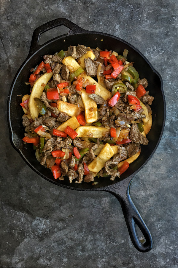 Ditch the bread in Philly Cheesesteak and use FRIES! Find the recipe for these Philly Cheesesteak Fries on Shutterbean.com!