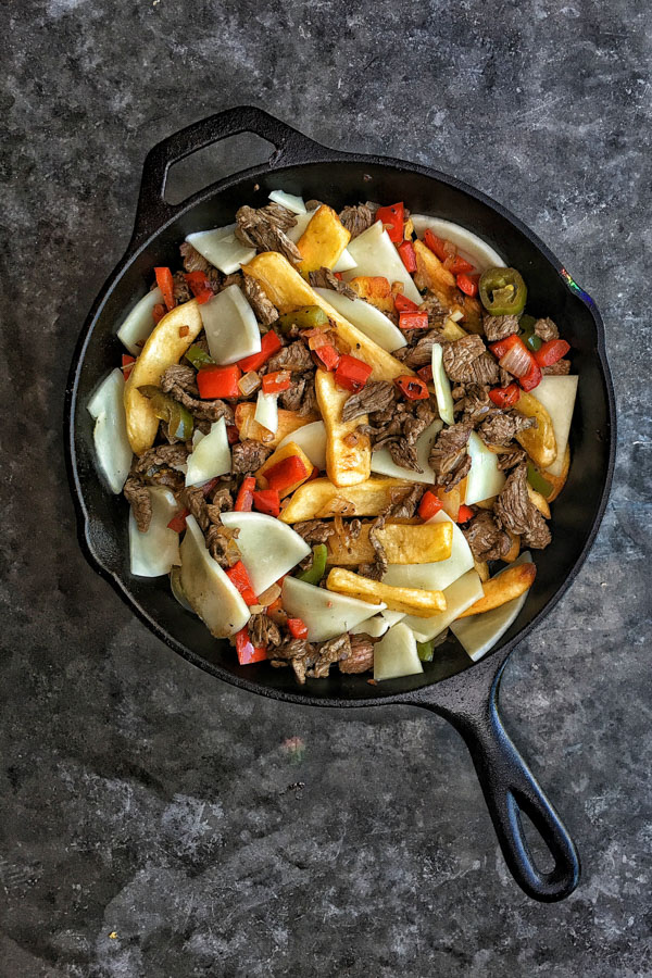  Ditch the bread in Philly Cheesesteak and use FRIES! Find the recipe for these Philly Cheesesteak Fries on Shutterbean.com!