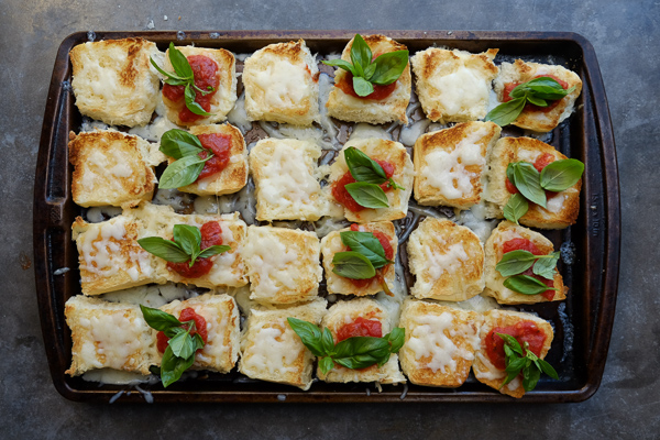 Zucchini Parmesan Sliders are a real crowd pleaser. Vegetarian too! Find the recipe on Shutterbean.com