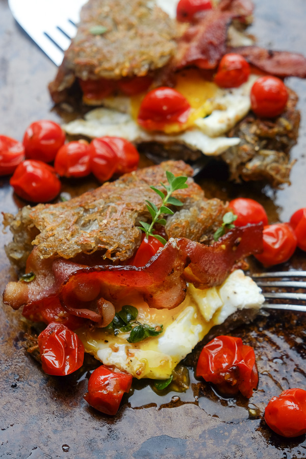 Hash Brown Omelet! A new take on breakfast. Inside you'll find fried eggs, tomatoes with oregano and bacon. Recipe on Shutterbean.com