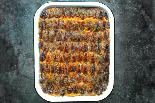 Pecan Topped Sweet Potatoes for a traditional Thanksgiving Feast! Find the recipe on Shutterbean.com