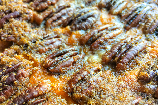 Pecan Topped Sweet Potatoes for a traditional Thanksgiving Feast! Find the recipe on Shutterbean.com